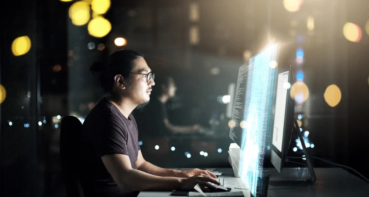 man working in front of a computer